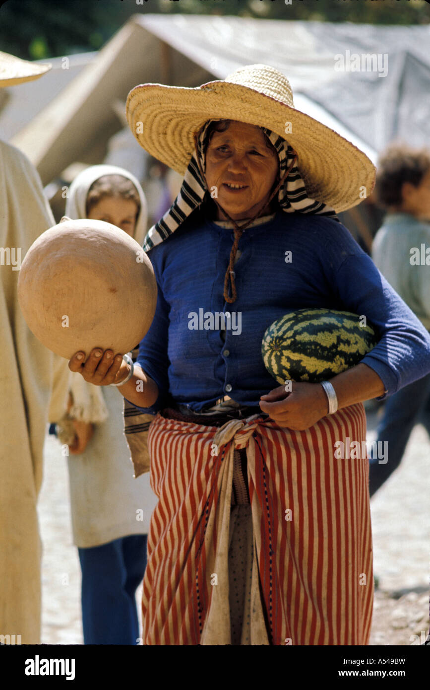 Painet hn1748 3352 morocco woman rif mountains buying pot chaouen country developing nation less economically developed Stock Photo