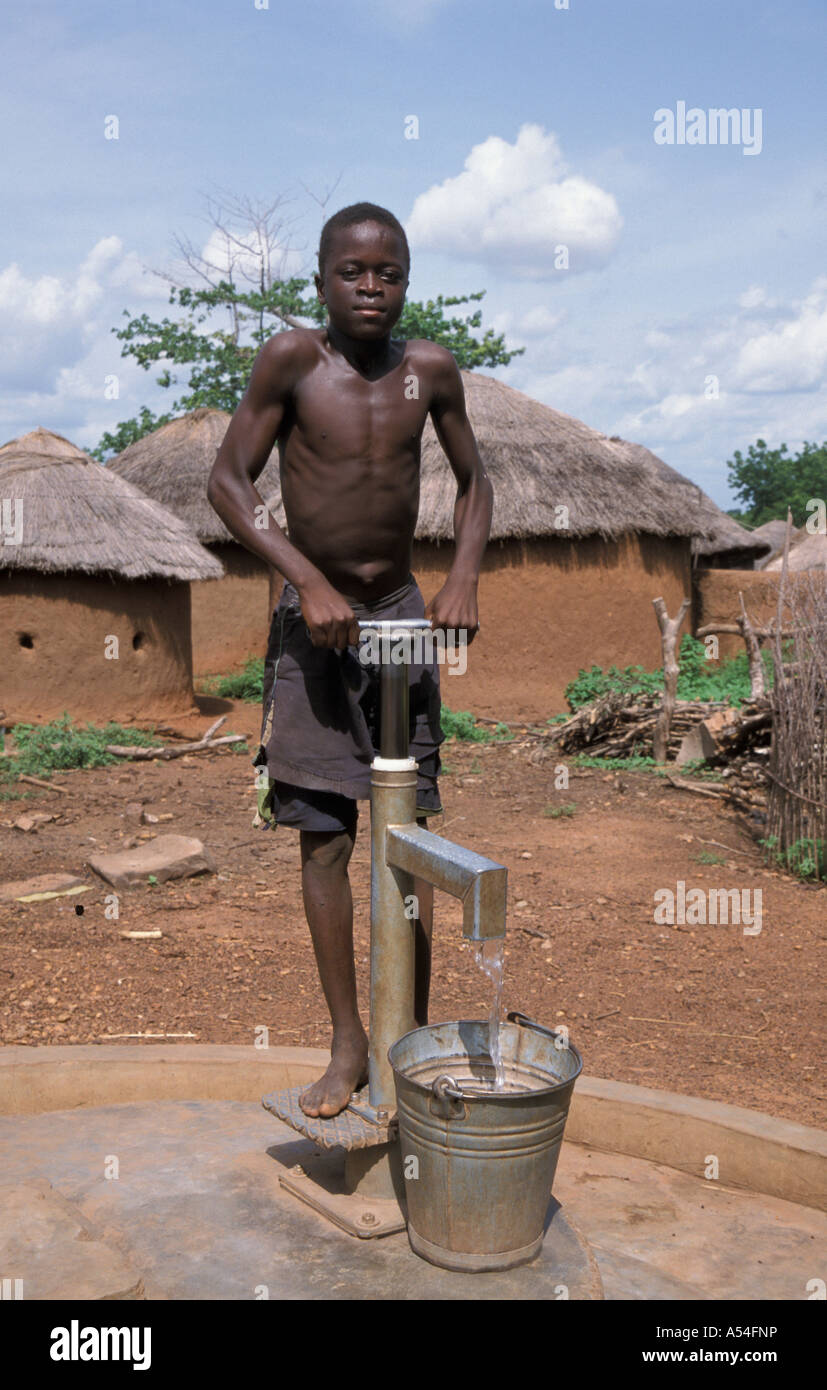 Painet hn2171 7672 ghana boy pumping water bolgatanga country developing nation less economically developed culture emerging Stock Photo