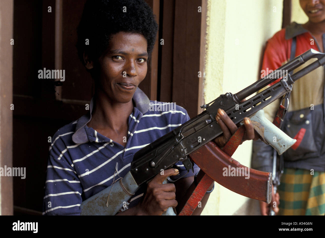 Painet hq1429 ethiopia female soldier oroma liberation front hararge ak47 arms fighter gun images unrest war country Stock Photo