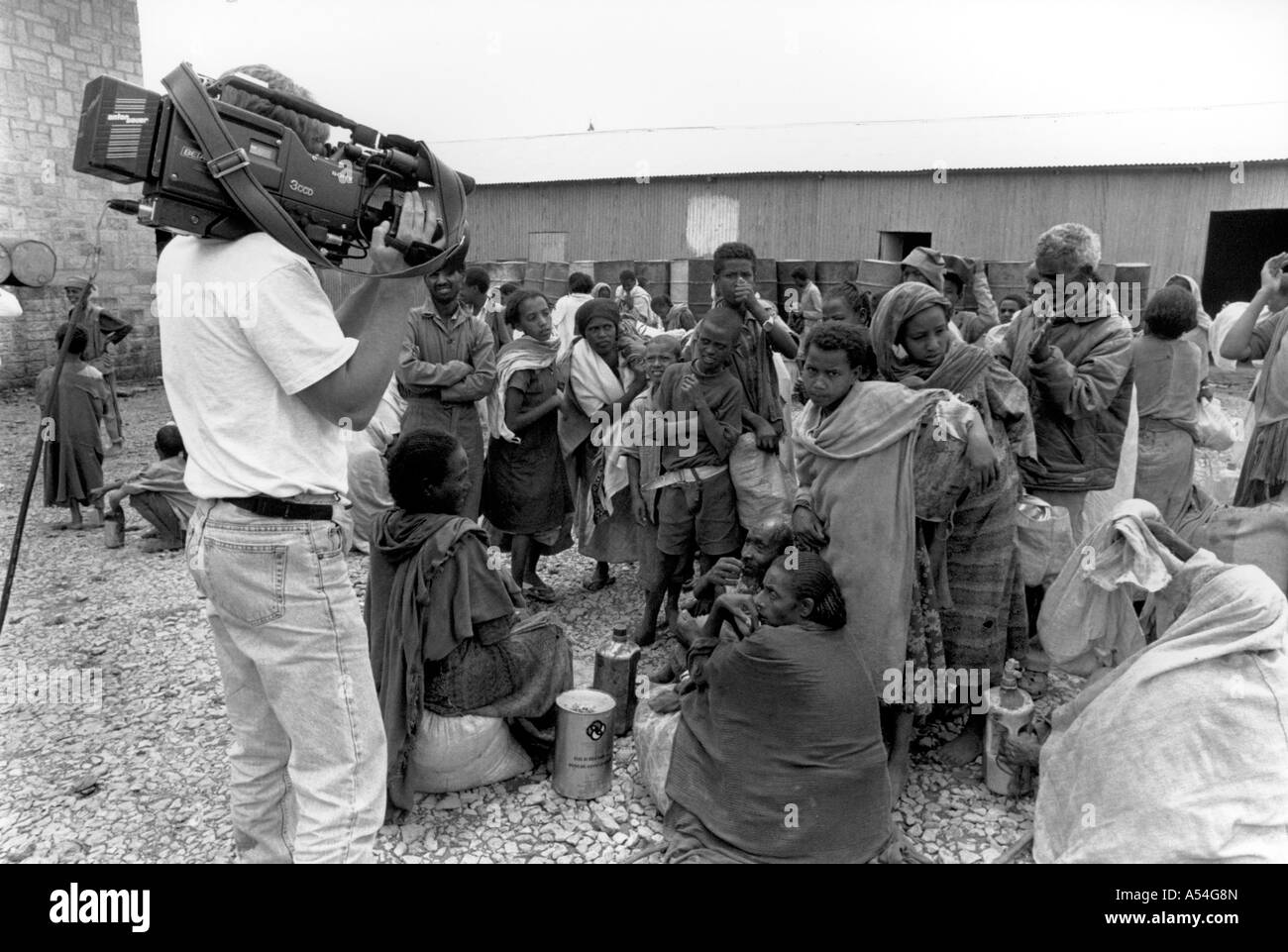 Painet hq1439 black and white media film team making movie famine catholic relief services food distribution center mekele Stock Photo