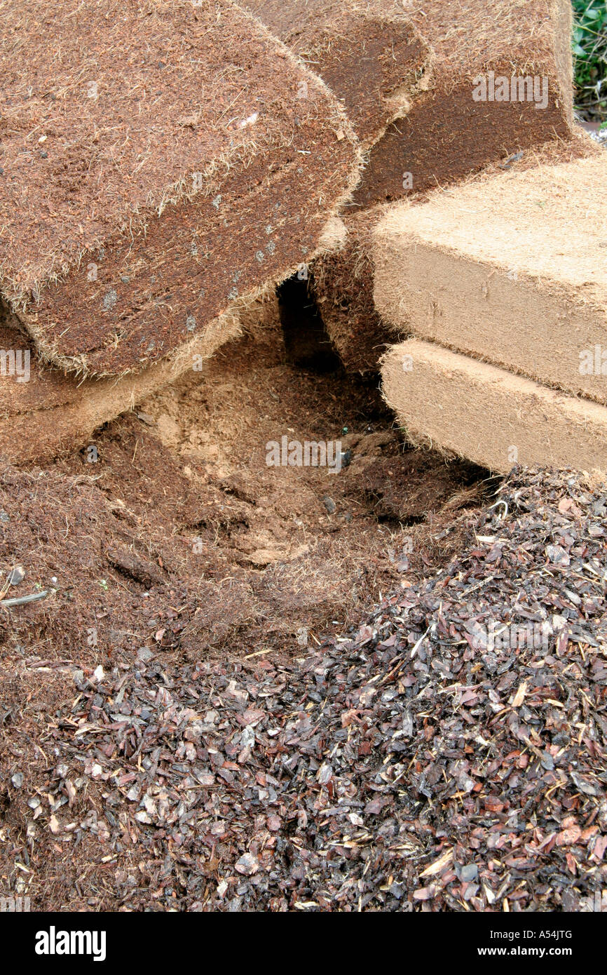 Coir and composted bark are valuable compost additives to enhance drainage and air holding capacity Stock Photo