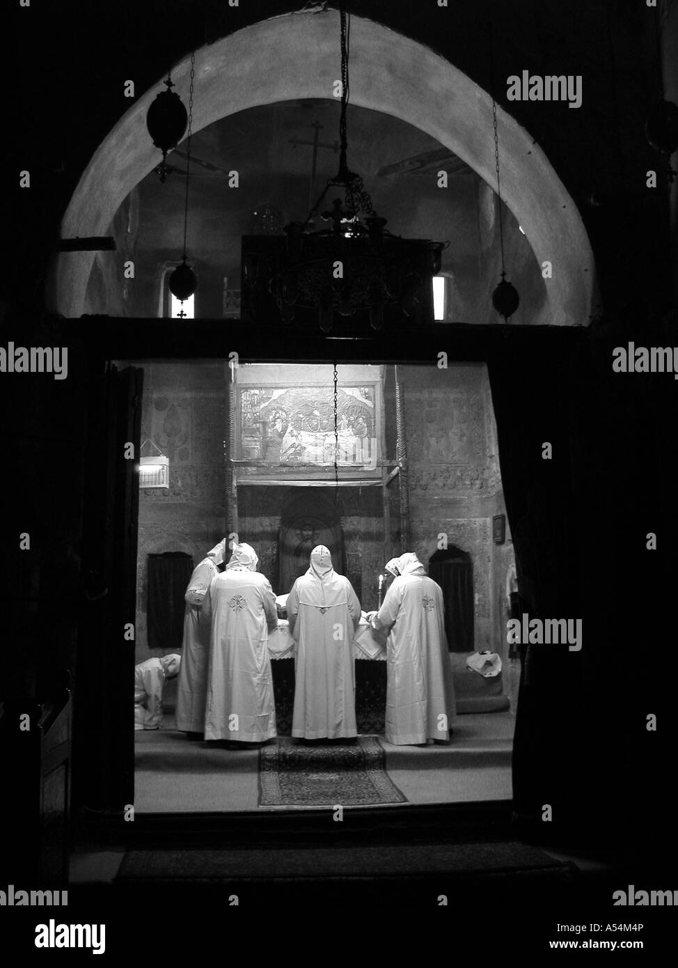 Painet ip1624 8075 black and white egypt monks celebrating mass virgin church sourian coptic orthodox monastery wadi natrun Stock Photo