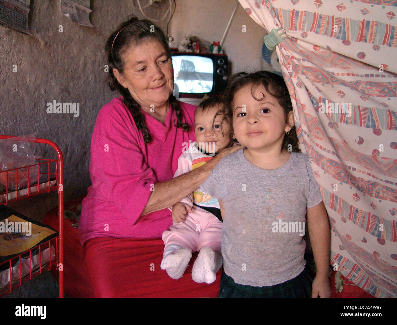 Painet ip1997 honduras woman grandchildren slum tegucigalpa country developing nation less economically developed culture Stock Photo