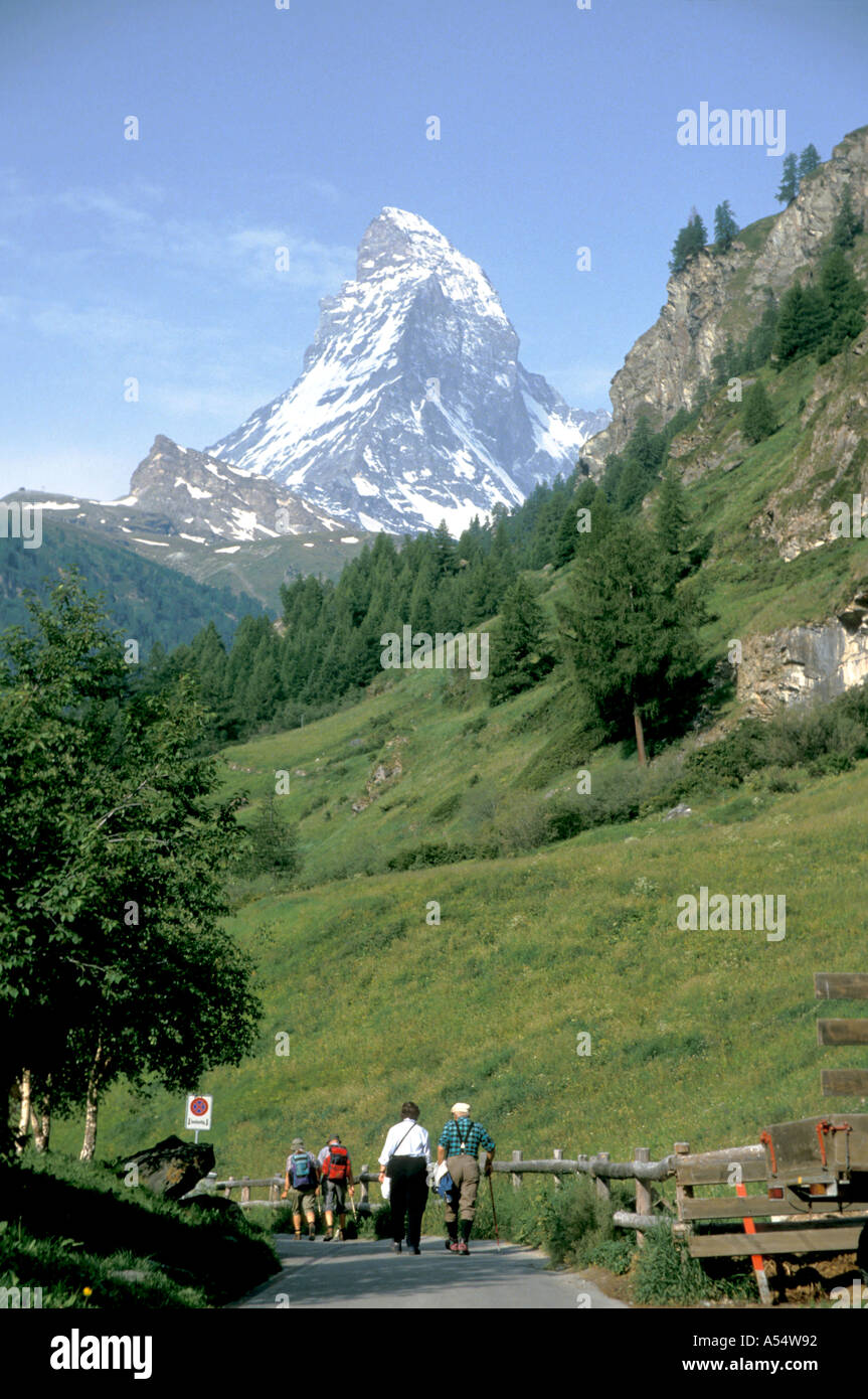 Europe Switzerland Zermatt The Materhorn viewed from the town with hikers on trail Stock Photo