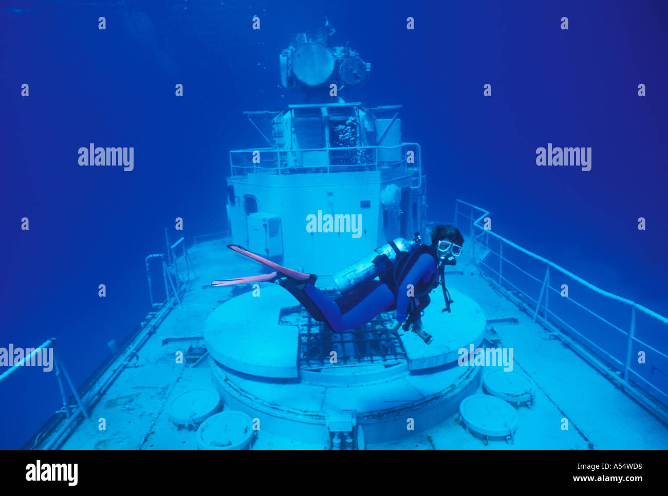 Cayman Brac woman scuba diver underwater on Wreck of Tibbetts Cayman Islands Stock Photo