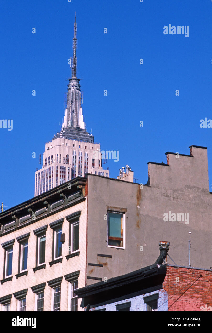 Empire State Building apartment buildings NYC Stock Photo