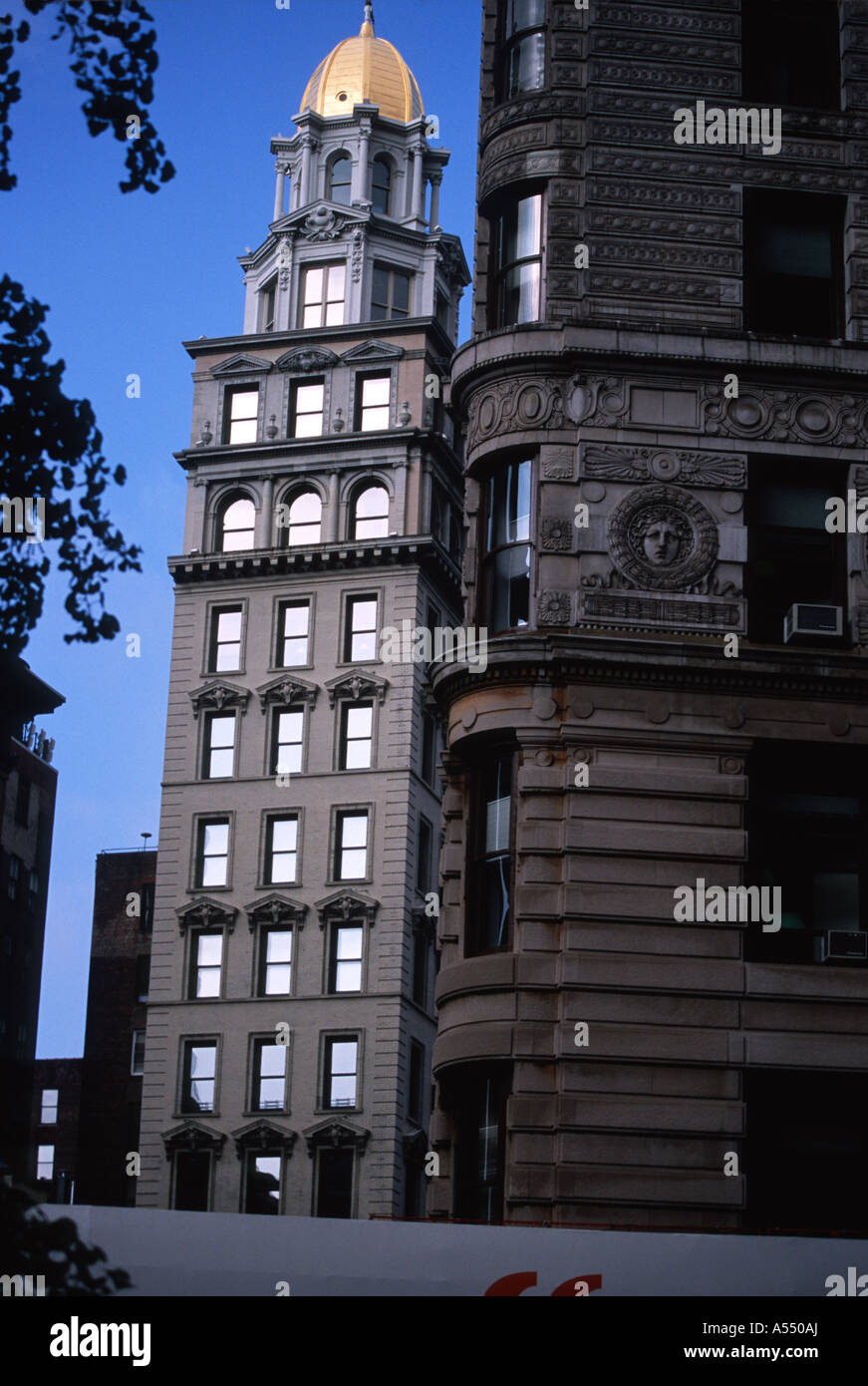Gold Domed building and the Flatiron Building NYC Stock Photo