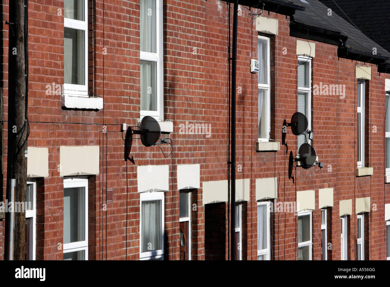 Terraced Houses with satellite dishes Stock Photo