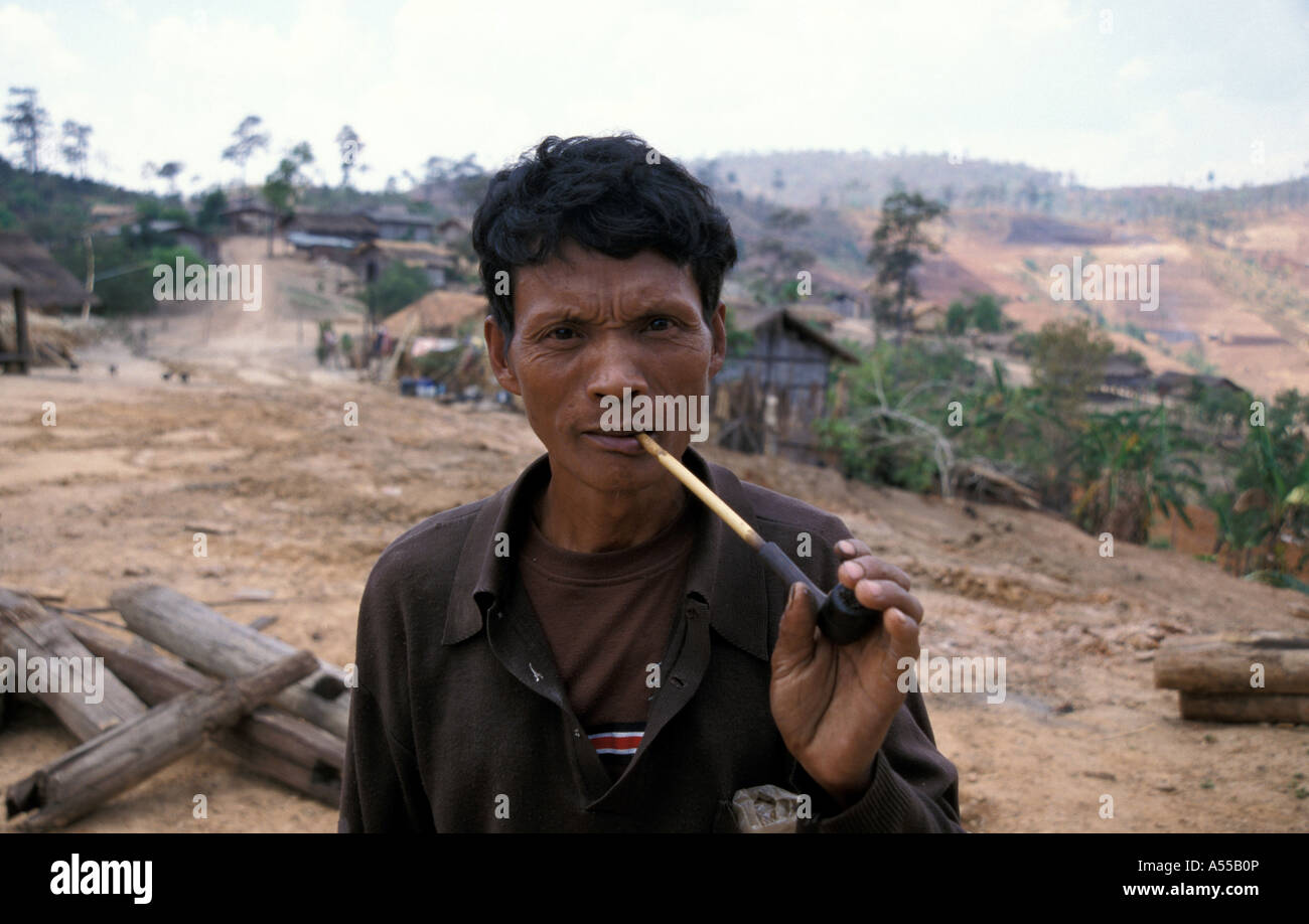 Painet ip2793 9391 thailand man smoking pipe lahu tribal village nasiri chiang mai country developing nation less Stock Photo