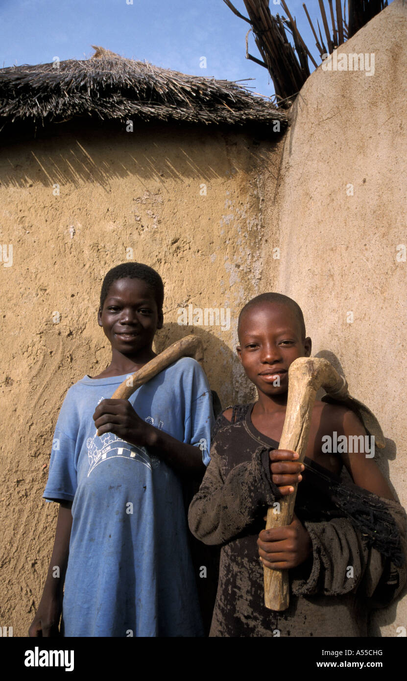 Painet ik0260 7566 ghana boys bongo bolgatanga holding hoe country developing nation less economically developed culture Stock Photo