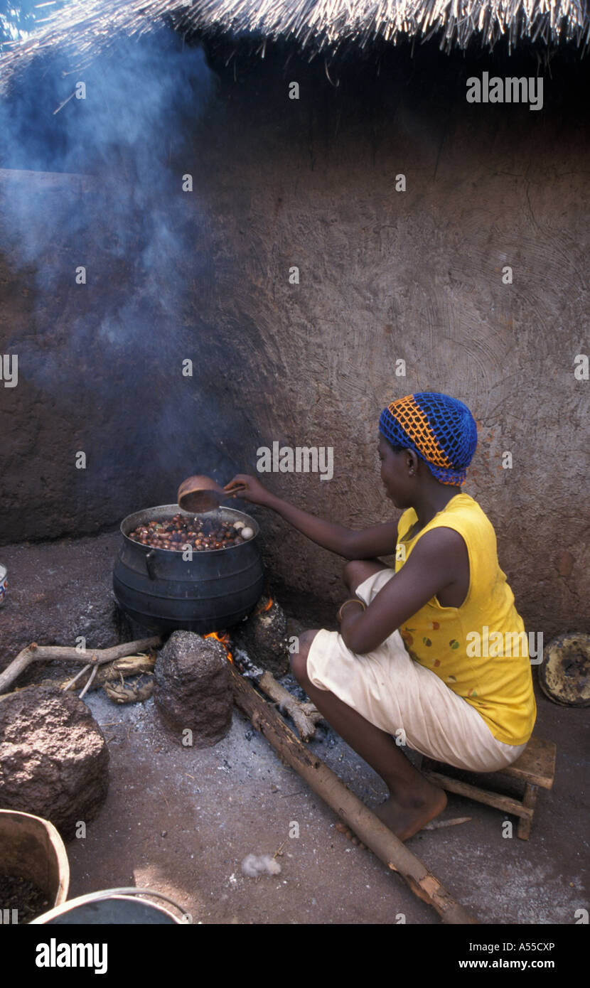 Painet ik0278 ghana woman cooking bolgatanga country developing nation less economically developed culture emerging market Stock Photo