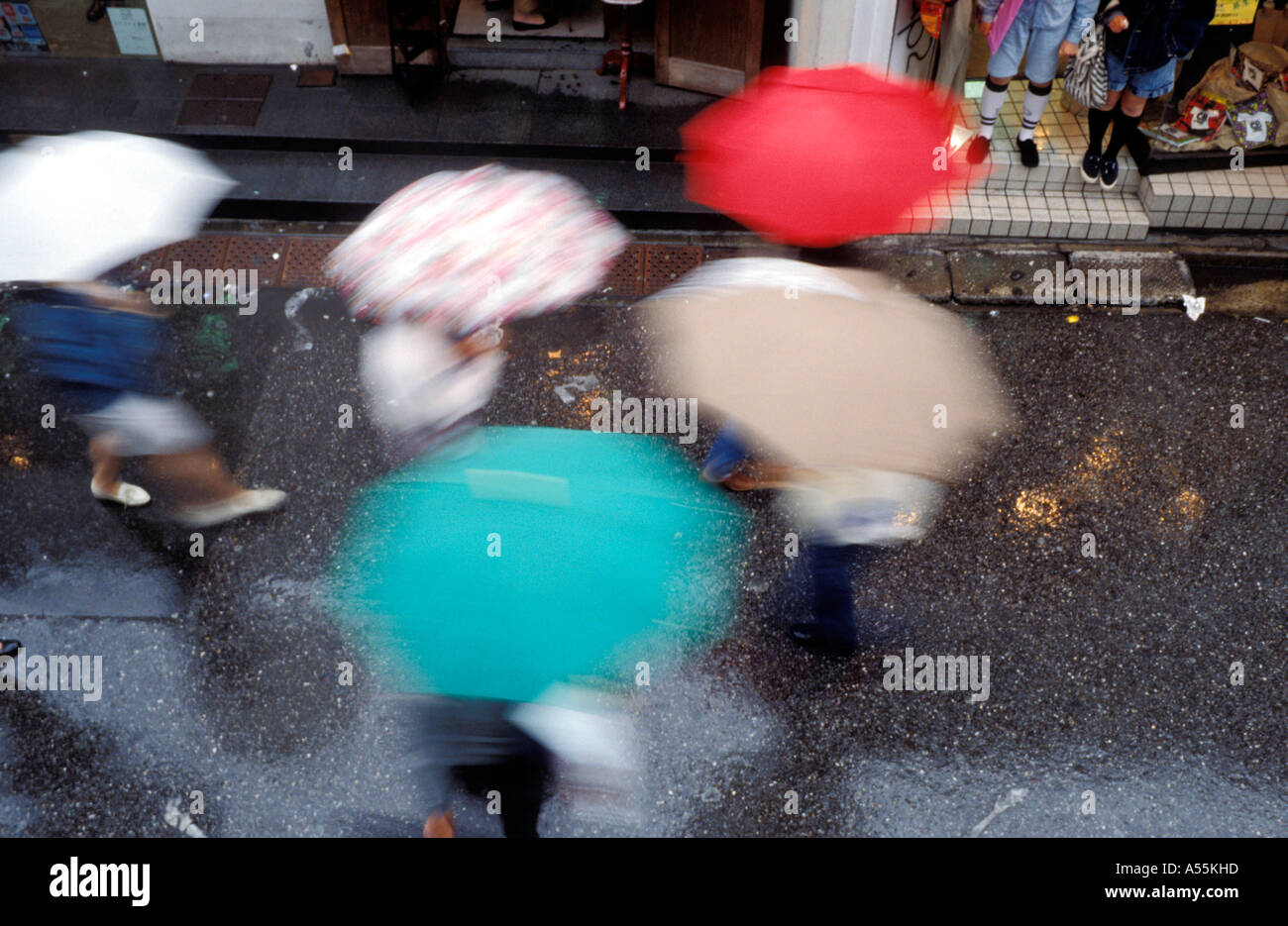 people with umbrellas Stock Photo