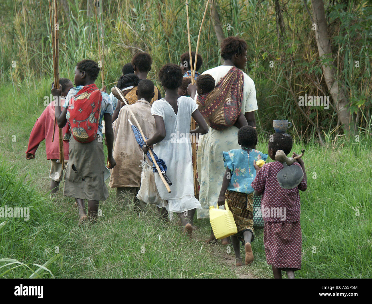 Painet is1659 zambia women children walking lake for fishing country developing nation less economically developed culture Stock Photo