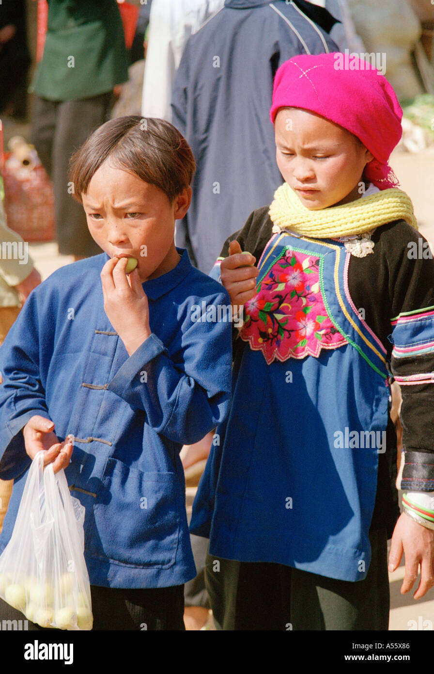 Hmong children at the market in BacHa Northern Vietnam Stock Photo
