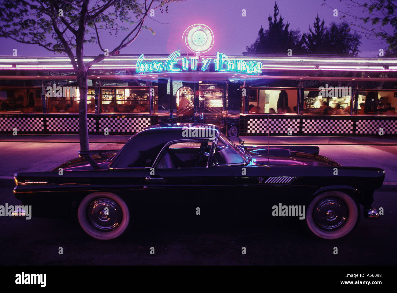 1957 Ford Thunderbird in front of Fog City Diner restaurant San Francisco California evening Stock Photo