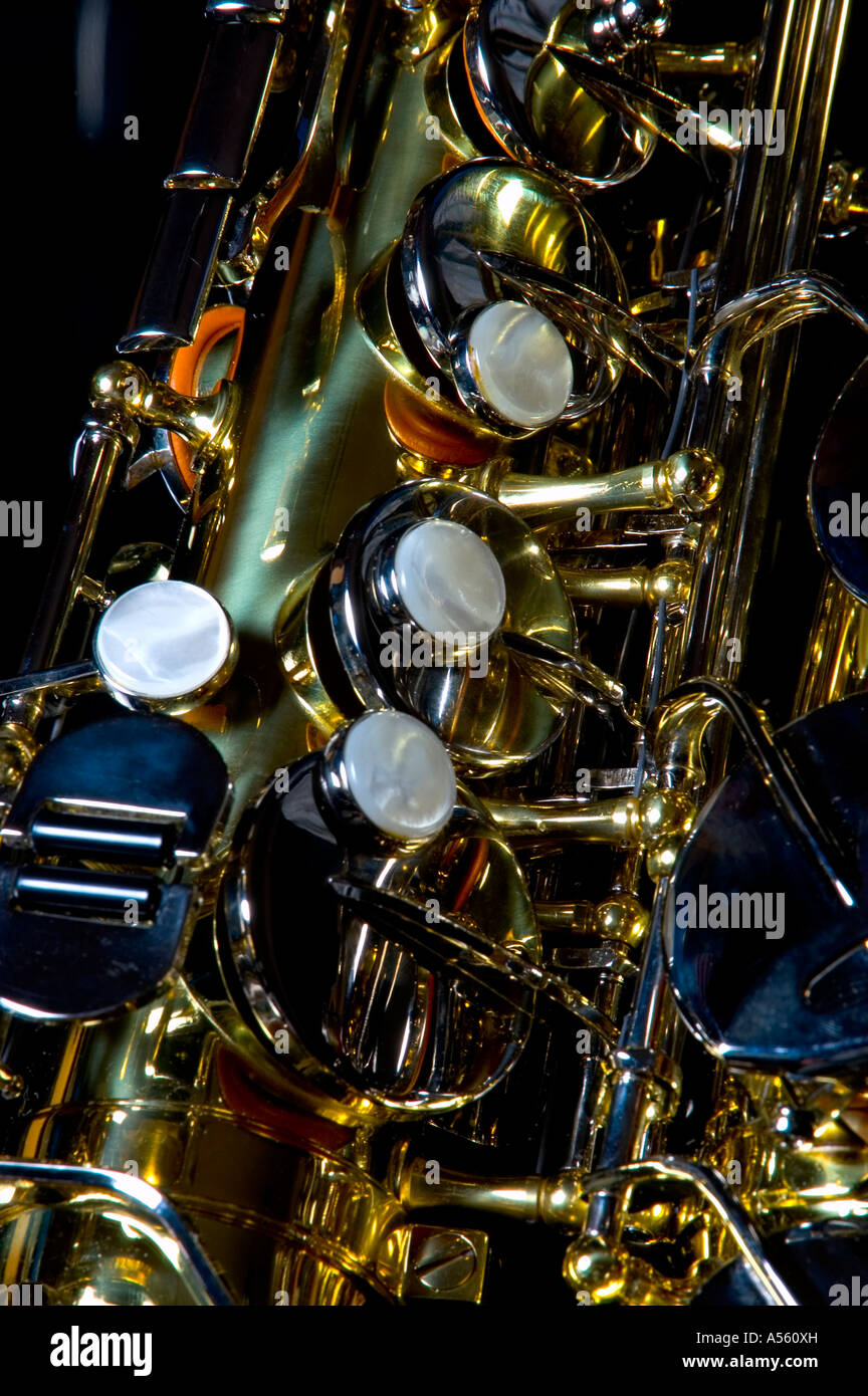 saxophone on black reflective background Stock Photo
