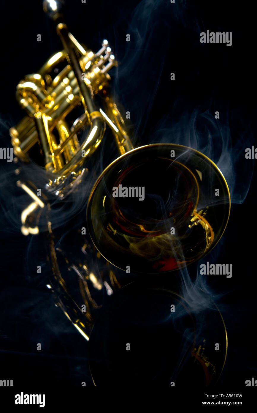 Trumpet(s) on black reflective background Stock Photo