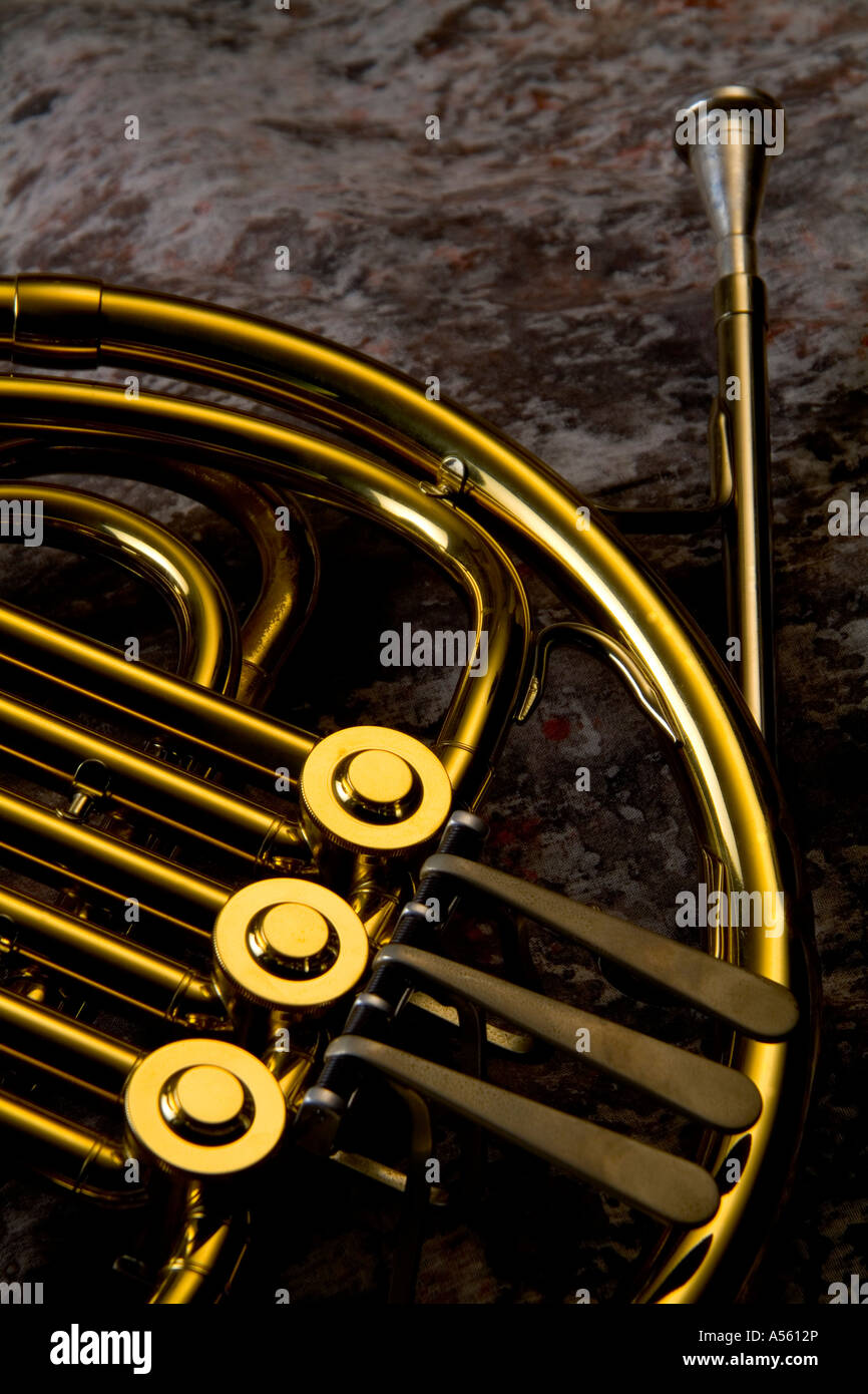 French horn on mottled background Stock Photo - Alamy
