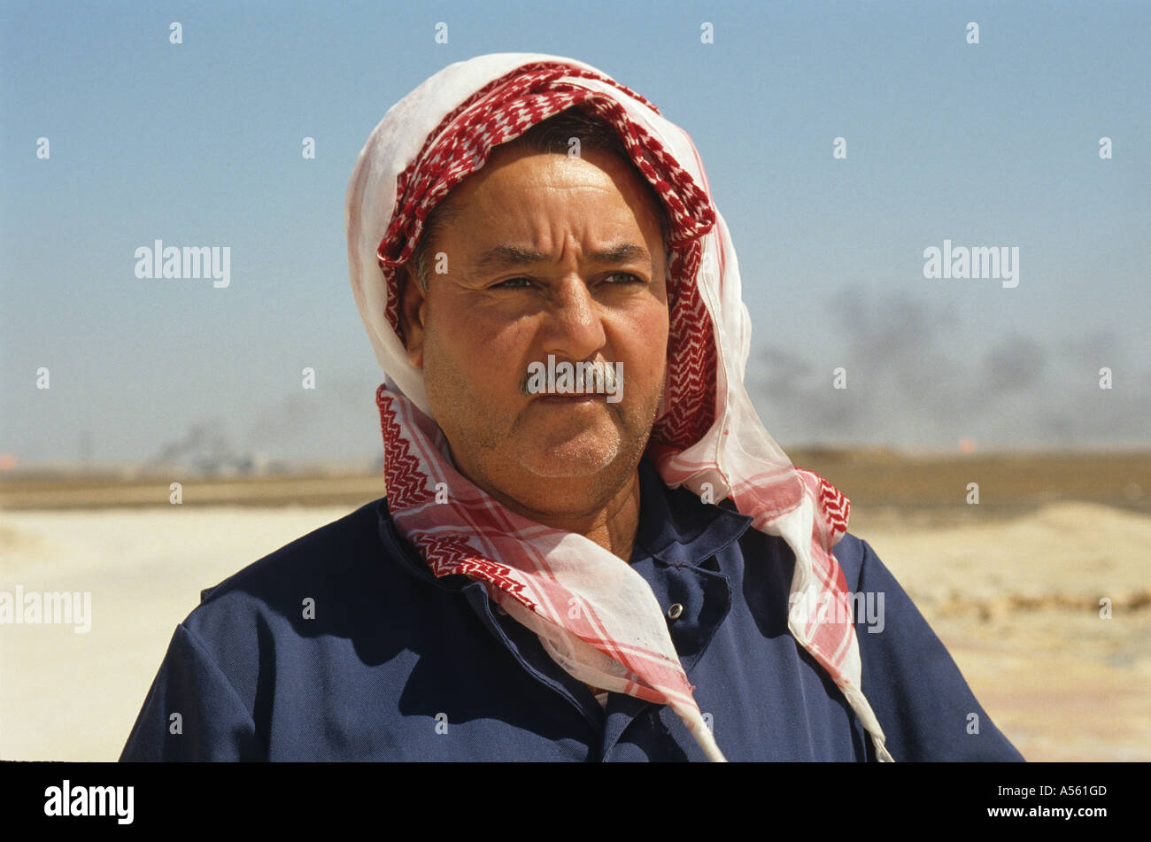 Elderly Arab male Oil worker in oil fields Kuwait Stock Photo
