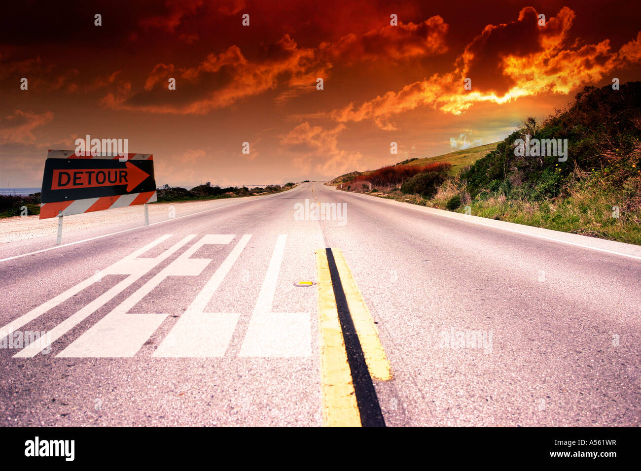 Atmospheric Road Toward Sunset With Sign Indicating a Detour Suggesting a Scenic Journey Stock Photo