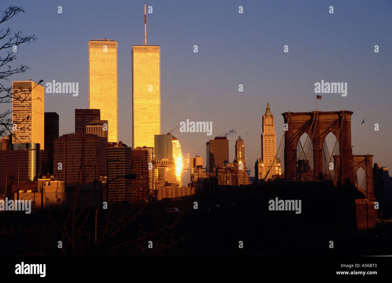 Twin towers of World Trade Center and Brooklyn Bridge New York NY USA at sunrise (before September 11th 2001) Stock Photo