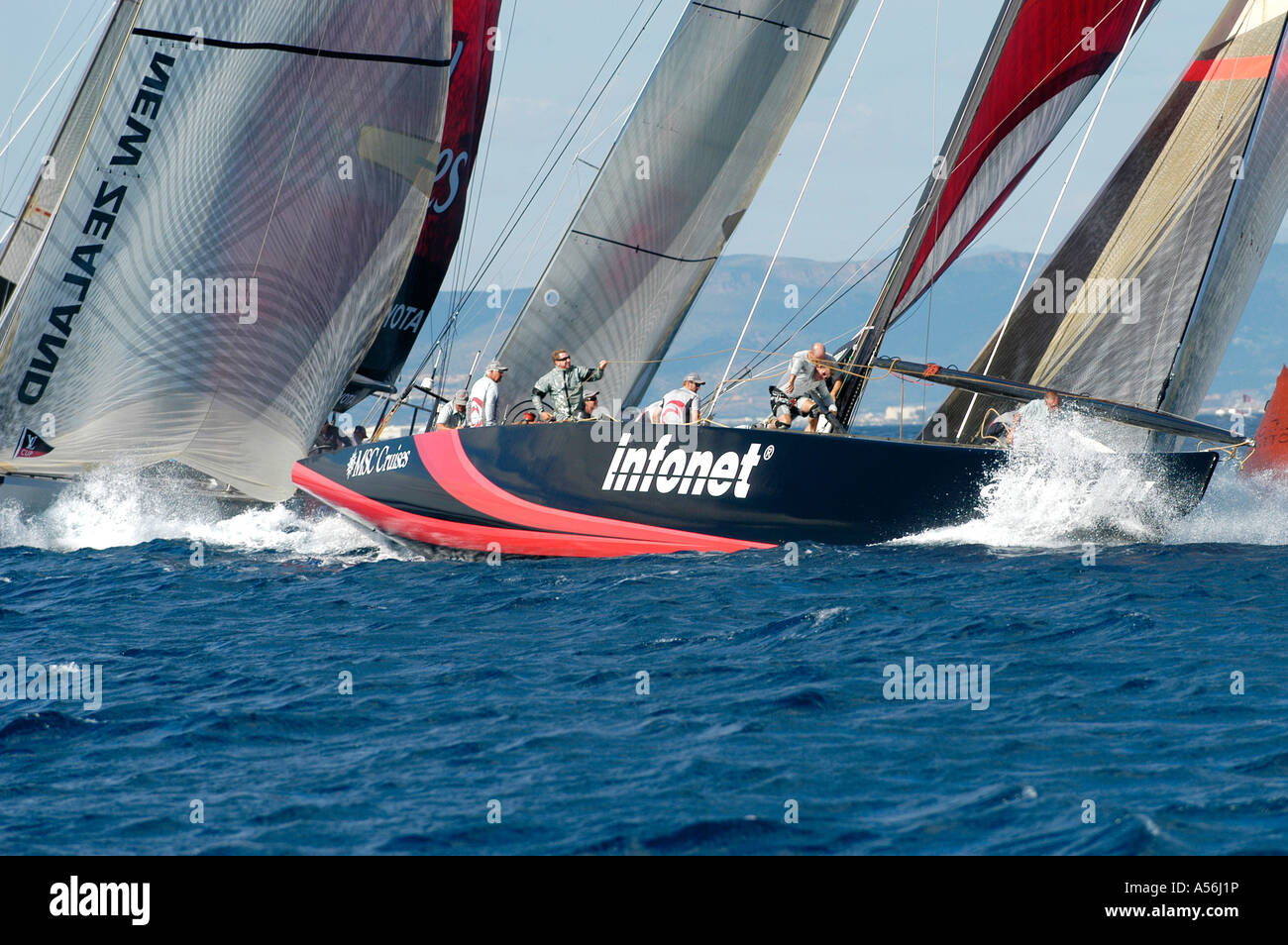 Team Alinghi SUI 64 leads to windward buoy  in front of  Emirates Team  New Zealand in NZL-81  LV Act 2 and 3 - Valenica, Spain Stock Photo