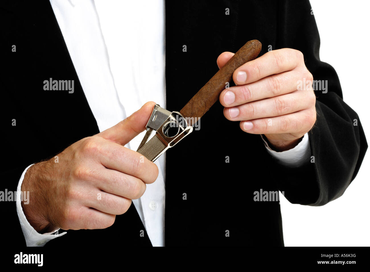 Man clipping cigar, close-up Stock Photo