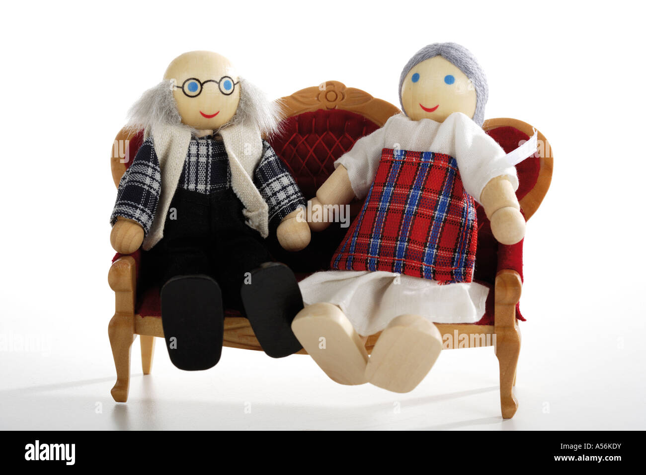 Two puppets sitting on sofa, close-up Stock Photo