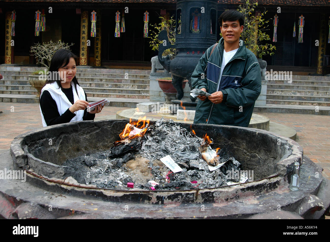 Fire sacrifice of money in the Den Trinh temple of the Parfum Pagoda Chua Huong Vietnam Stock Photo