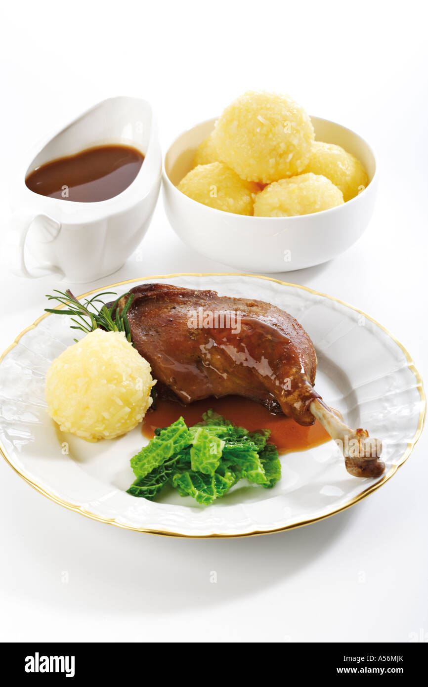 Roast goose with side dishes, elevated view Stock Photo Alamy