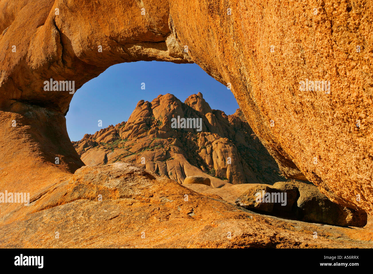 rock arch made of red granite Spitzkoppe area Namibia Africa Stock Photo
