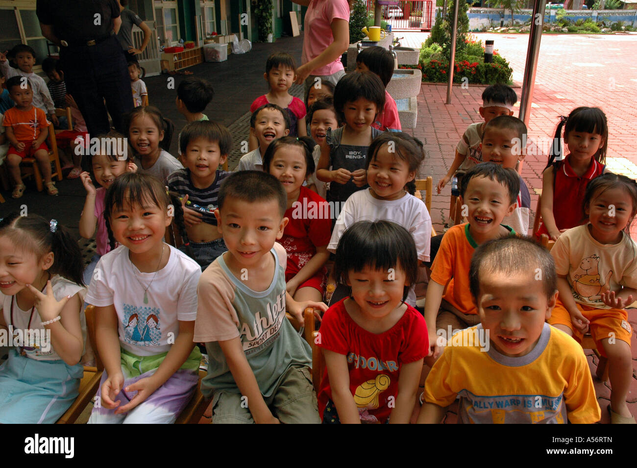 Painet ja0810 taiwan school children kids special needs tainan photo 2004 asia china chinese child kid mental problem play Stock Photo
