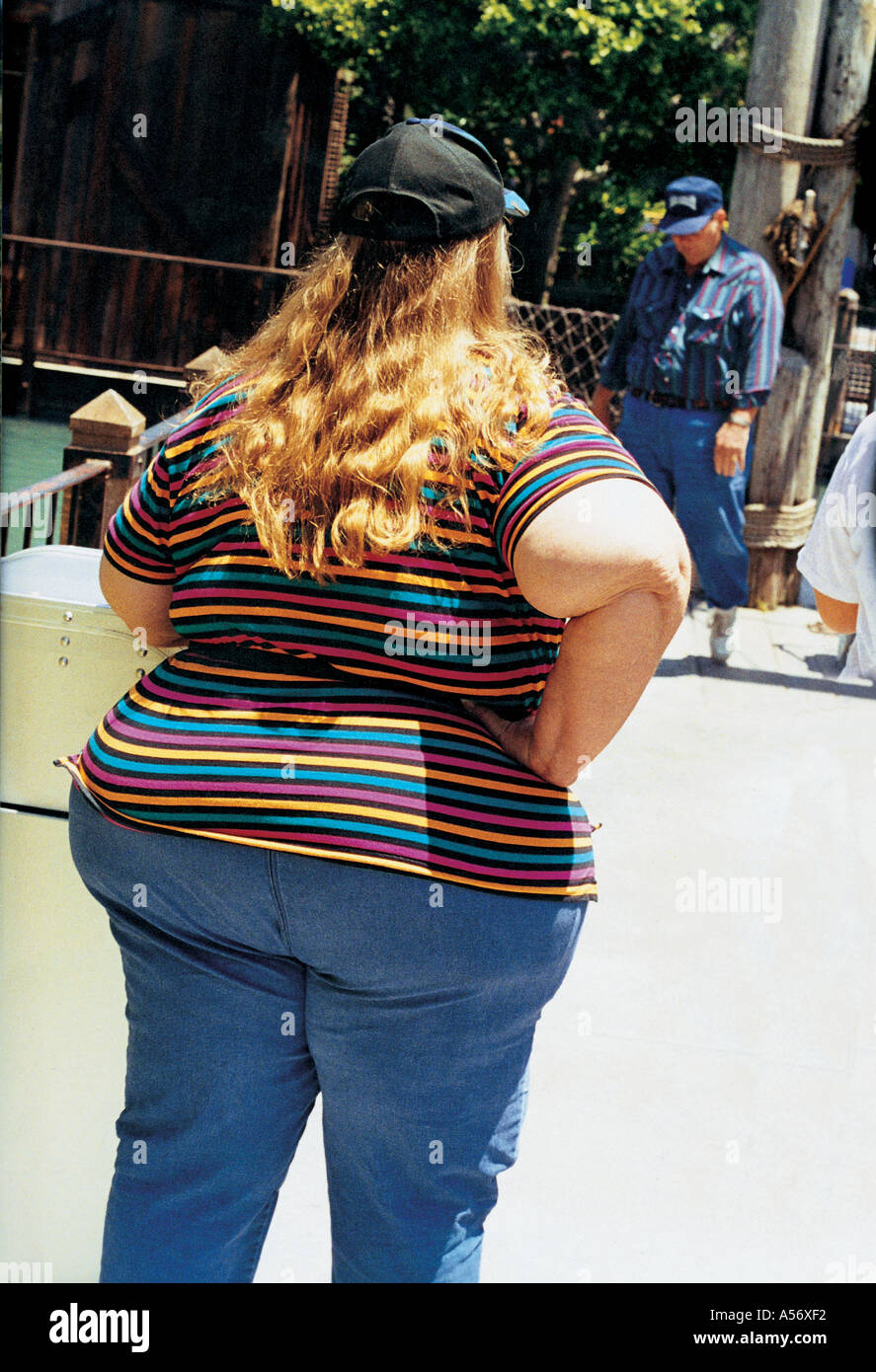 Fat obese funny woman women in jeans Times Square New York New York NY NY USA United States of America American Americana 1999 Stock Photo