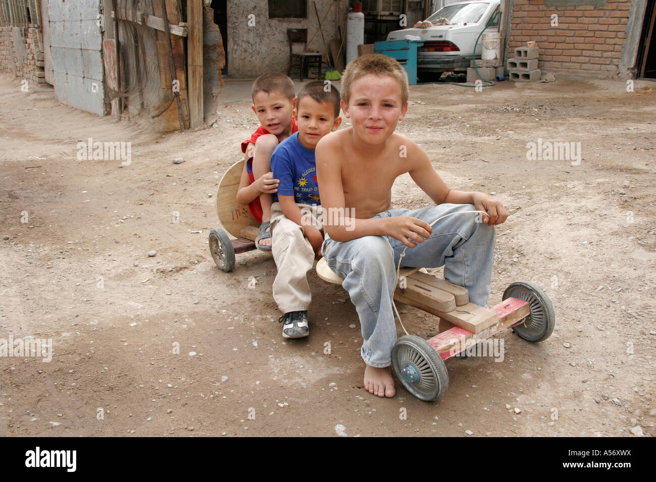 Painet ja1095 mexico hispanic boys playing gocart juarez chihuahua