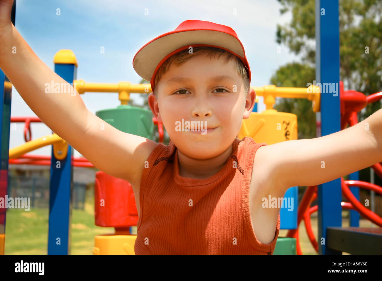 Child playing on colourful playground equipment Stock Photo Alamy