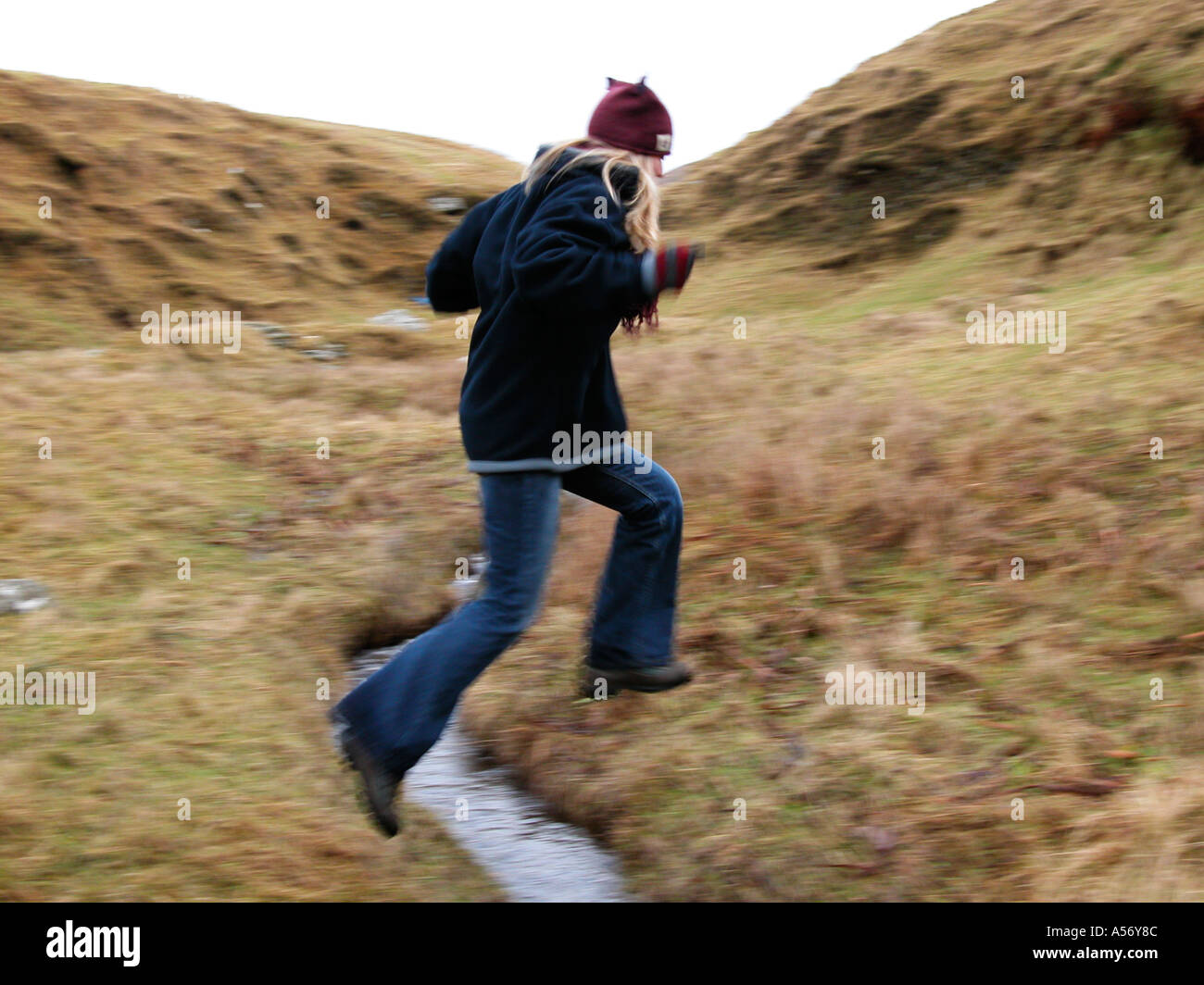 Girl jumping in river hi-res stock photography and images - Alamy