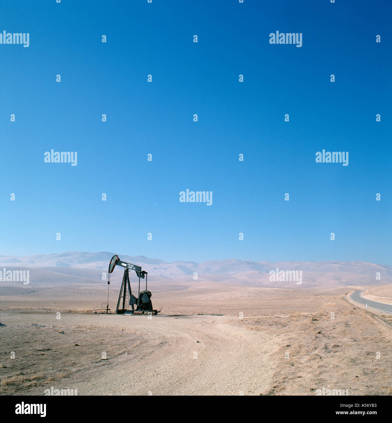Isolated Oil Well near Bakersfield, Southern California, USA Stock Photo