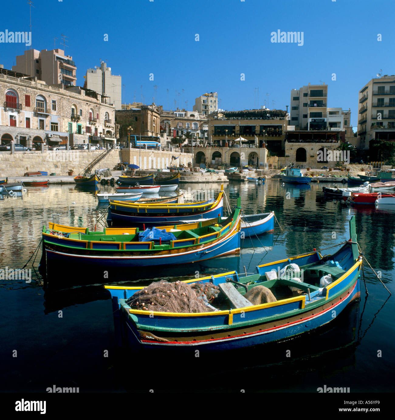 Traditional local fishing boat (Luzzus or Kajjiks), St Julian's Harbour, Malta Stock Photo