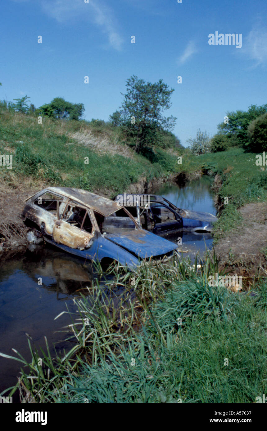 Abandoned burnt out cars uk hi-res stock photography and images - Alamy