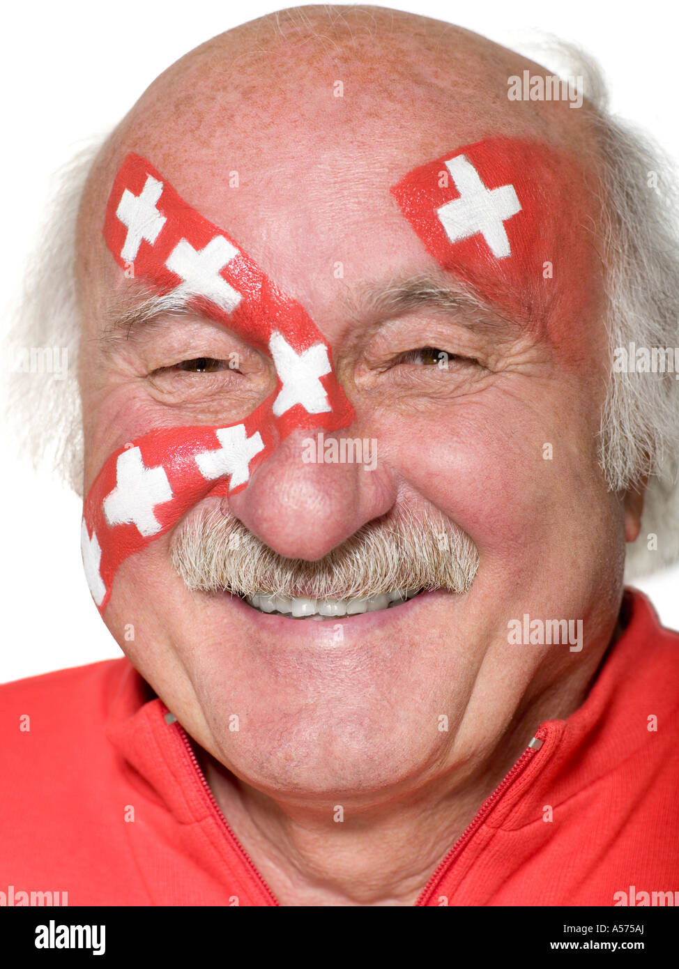 Senior man with Swiss flag painted on face Stock Photo