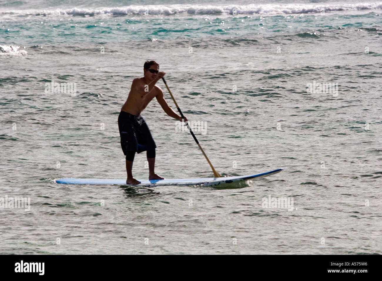 Surfer standing surfboard on hi-res stock photography and images - Alamy