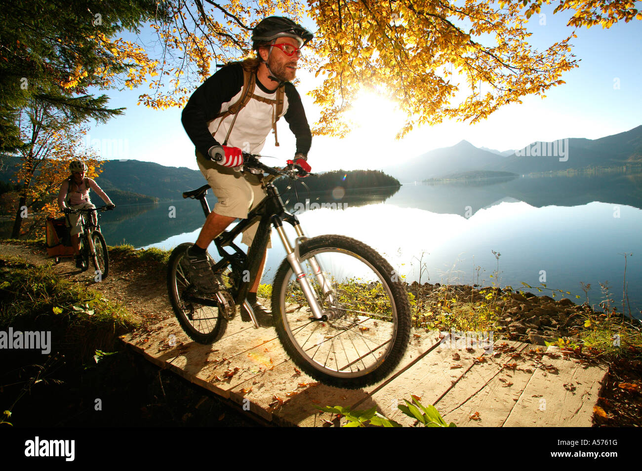 Germany, Bavaria, Couple mountain biking Stock Photo - Alamy