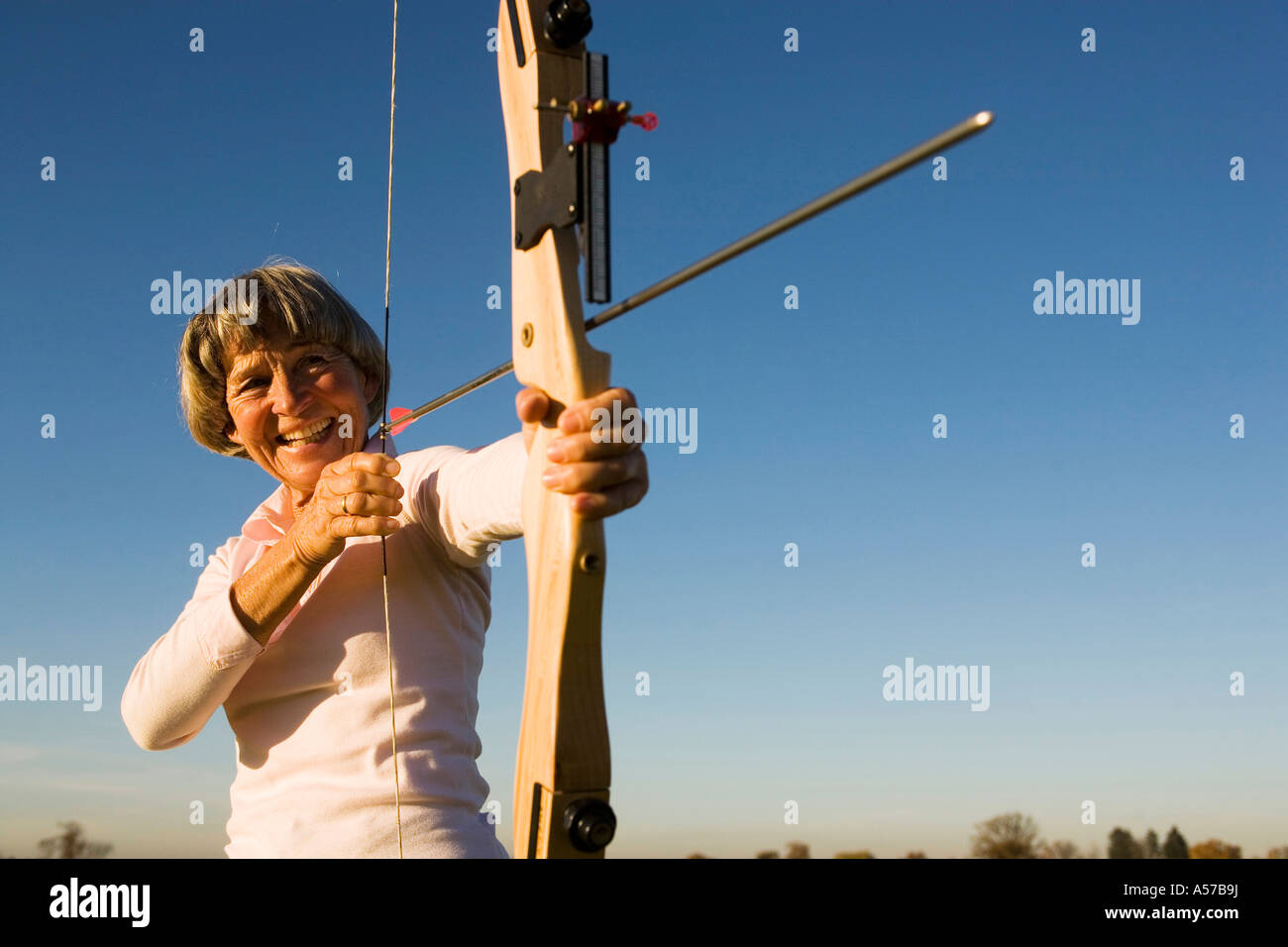 Woman bow arrow heart hi-res stock photography and images - Alamy
