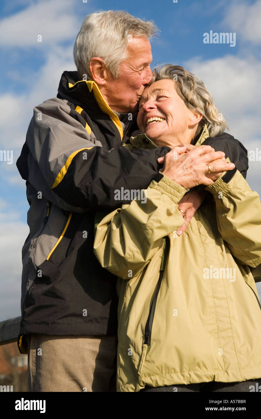 Old woman and young man kissing hi-res stock photography and images - Alamy