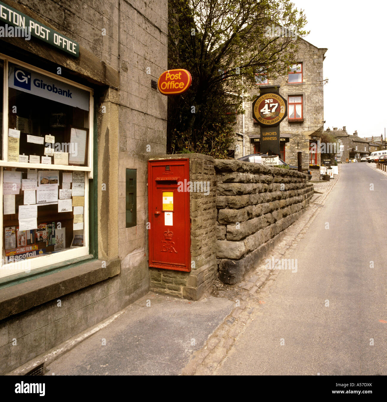 UK Yorkshire Wharfedale Grassington post box built into wall outside Post Office Stock Photo
