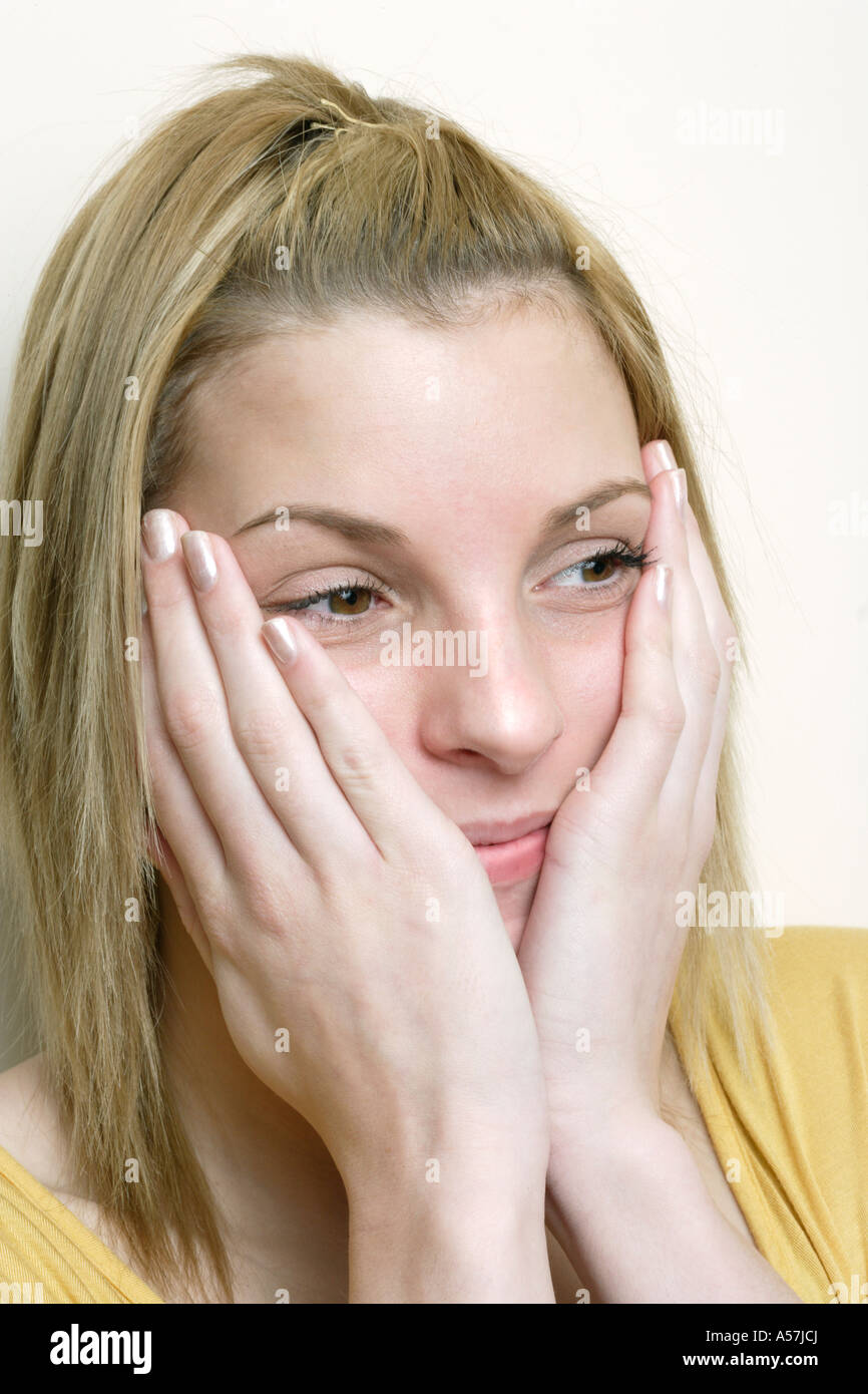 Close up woman face hands hi-res stock photography and images - Alamy