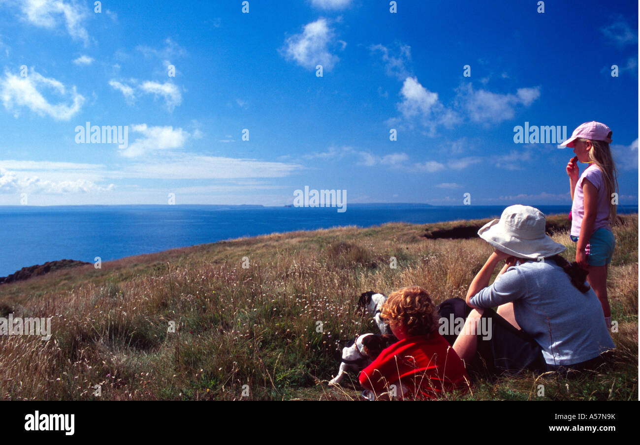Family with children rocks sea hi-res stock photography and images - Alamy