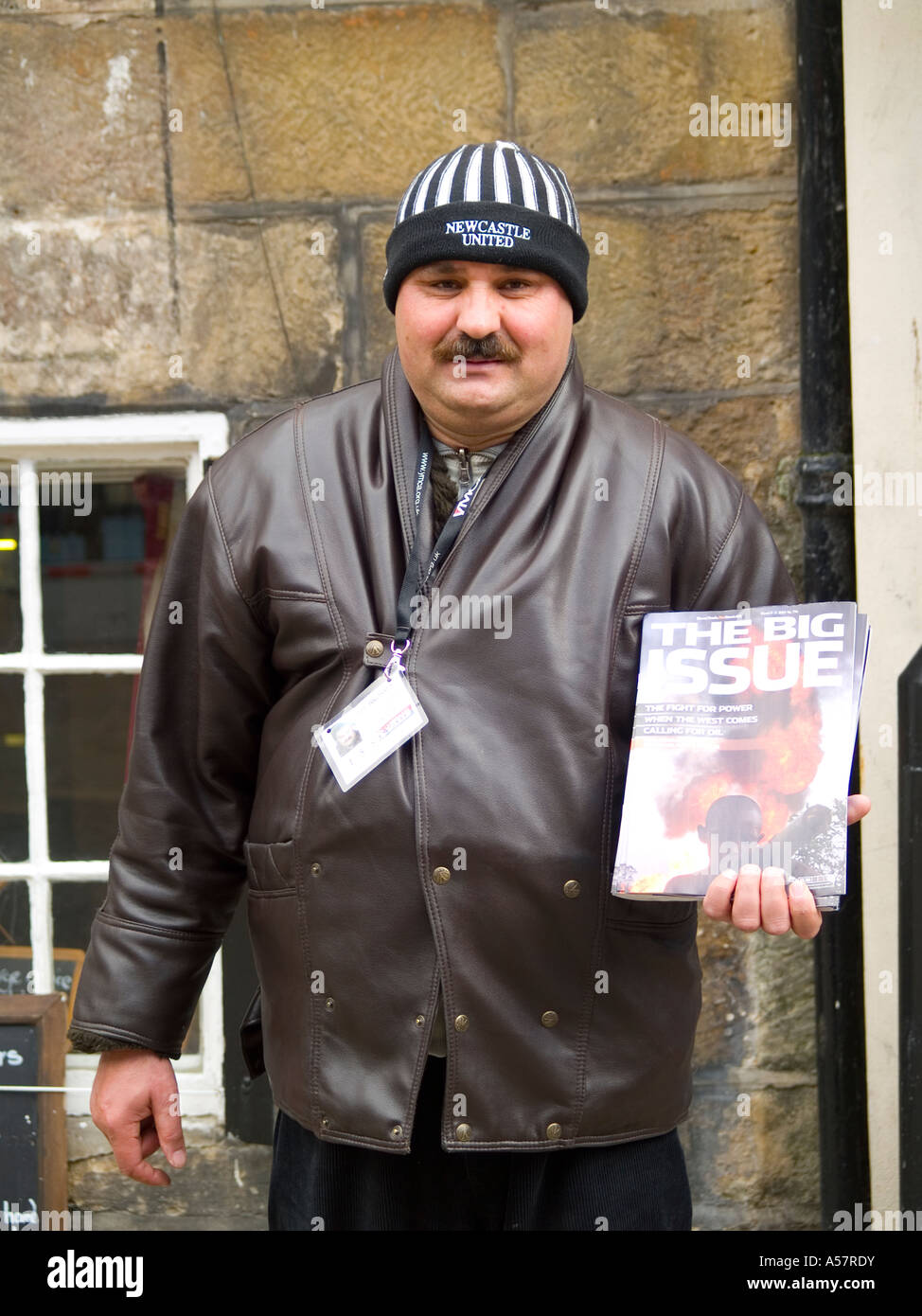 Romanian immigrant selling The Big Issue in Whitby two months after his arrival in UK March 2007 Stock Photo