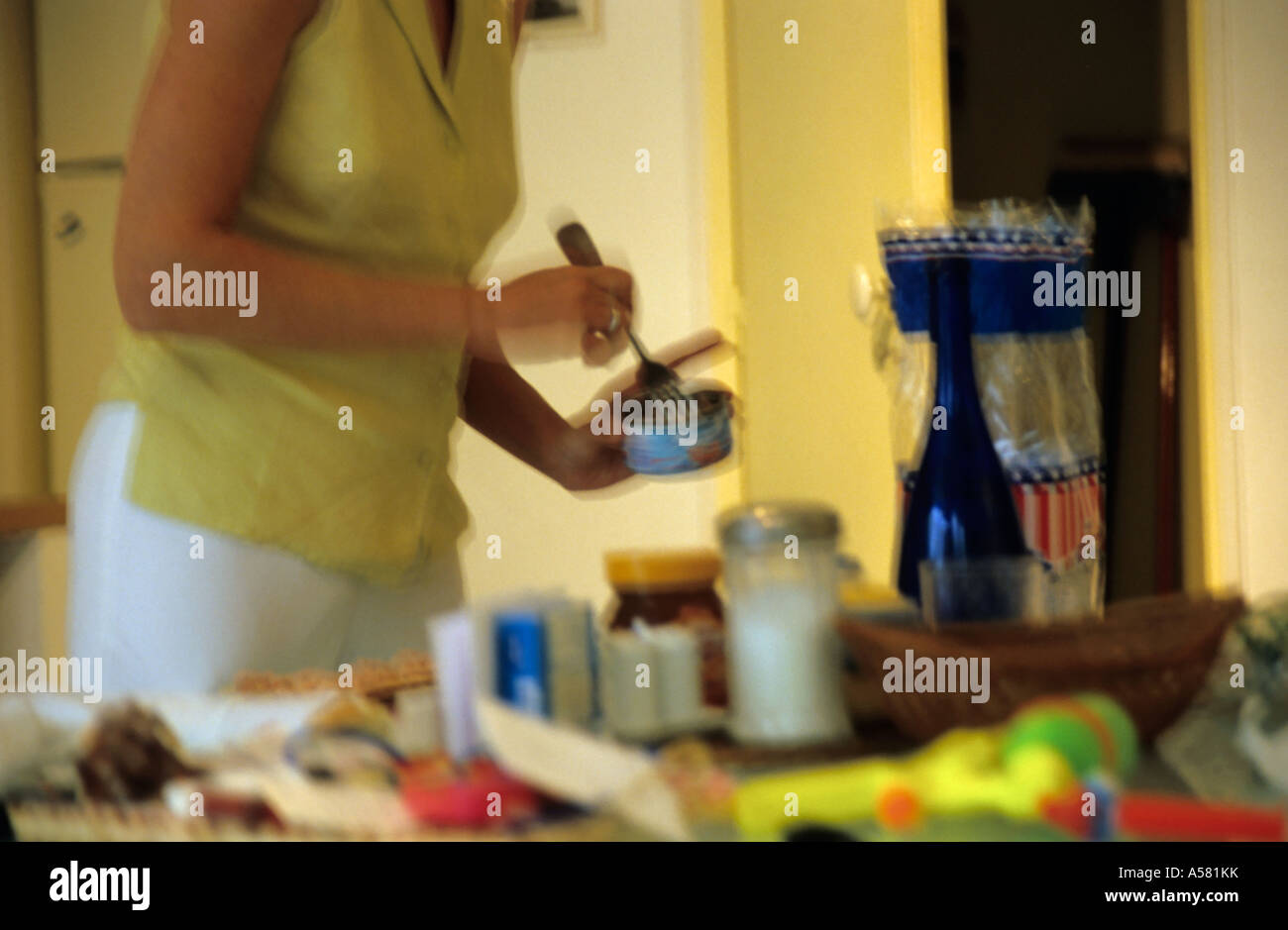 Woman busy preparing sandwiches in the kitchen for her family Stock Photo Alamy