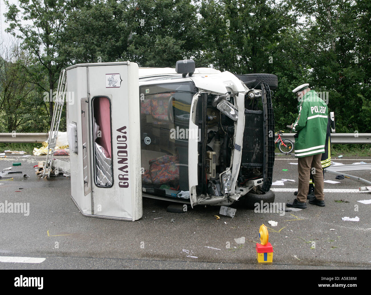 A camping car has fallen over in an accident Stock Photo